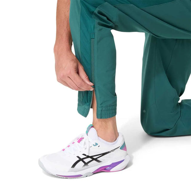 Spodnie tenisowe Asics Match Pant turkusowe